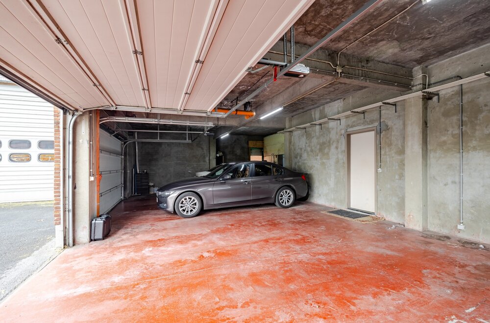 opbrengsteigendom-met-5-appartementen-en-5-garages-op-toplocatie-te-wetteren-004.jpg