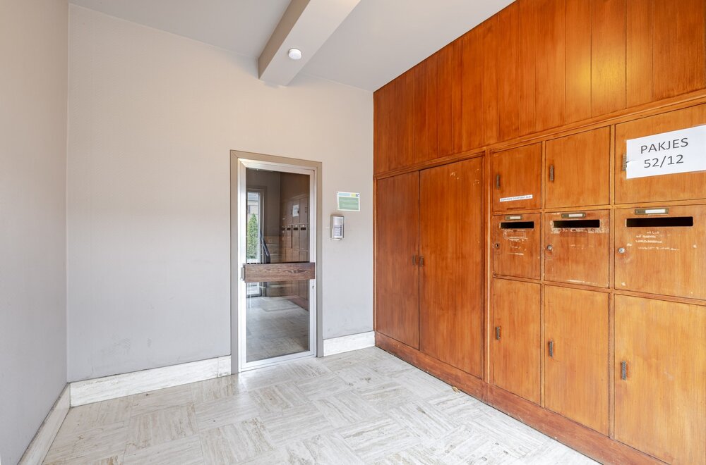 opbrengsteigendom-met-5-appartementen-en-5-garages-op-toplocatie-te-wetteren-005.jpg