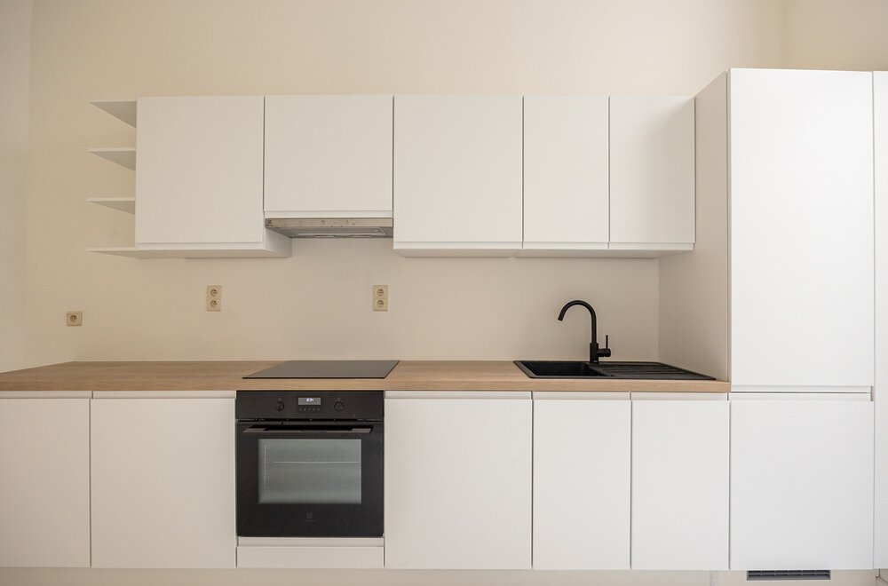volledig-gerenoveerd-gelijkvloers-appartement-met-zuidoost-gericht-koertje-in-antwerpen004.jpg