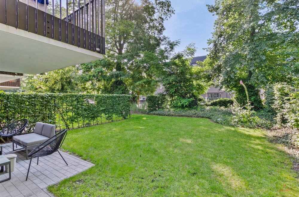 instapklaar-gelijkvloers-appartement-met-tuin-terras-en-2-autostaanplaatsen-in-olsene003.jpg